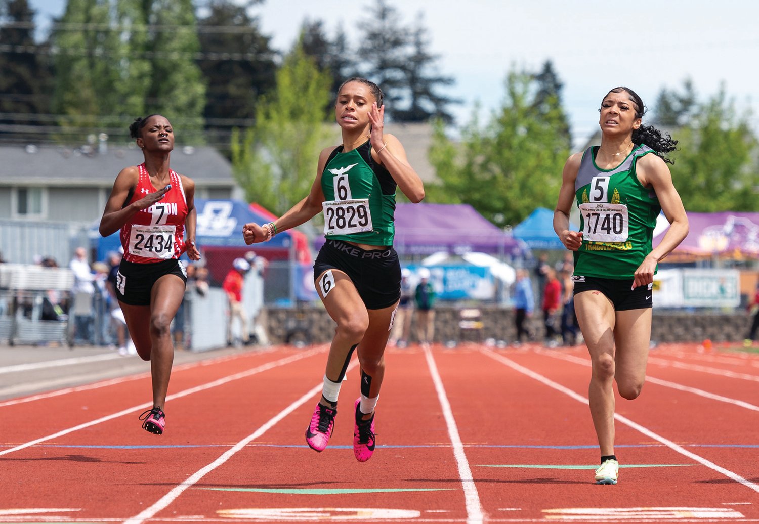 Tumwater's Ava Jones strides toward the finish line in the 2A Girls 100 prelims at the 4A/3A/2A State Track and Field Championships on Friday, May 27, 2022, at Mount Tahoma High School in Tacoma. (Joshua Hart/For The Chronicle)
